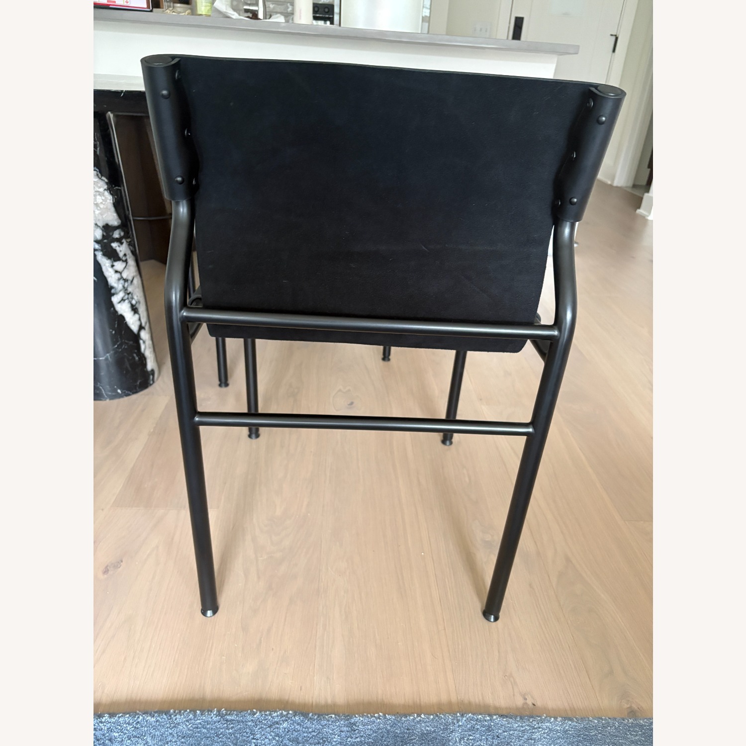 CB2 Surf Sling Black Leather Dining Chairs - image-5