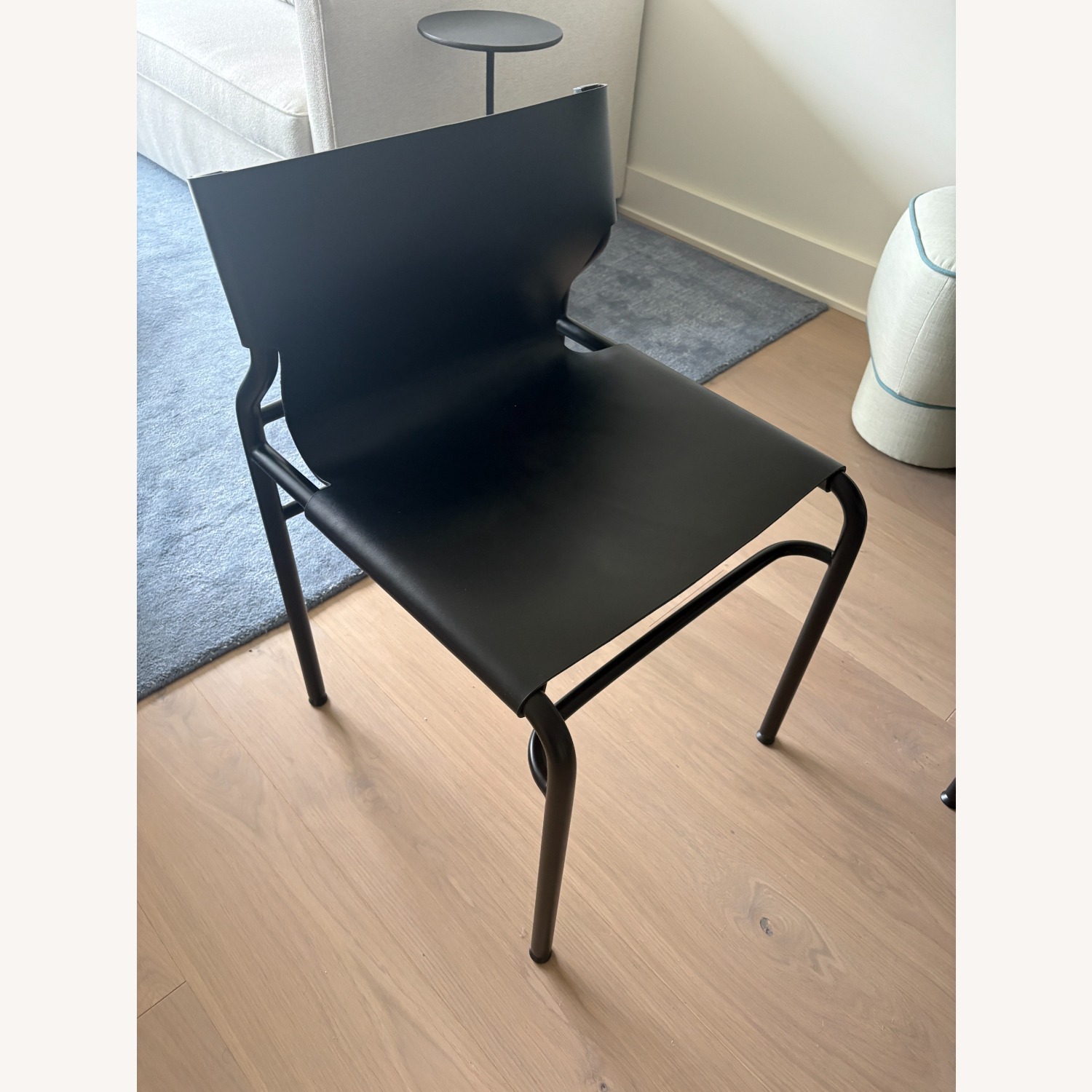CB2 Surf Sling Black Leather Dining Chairs - image-3