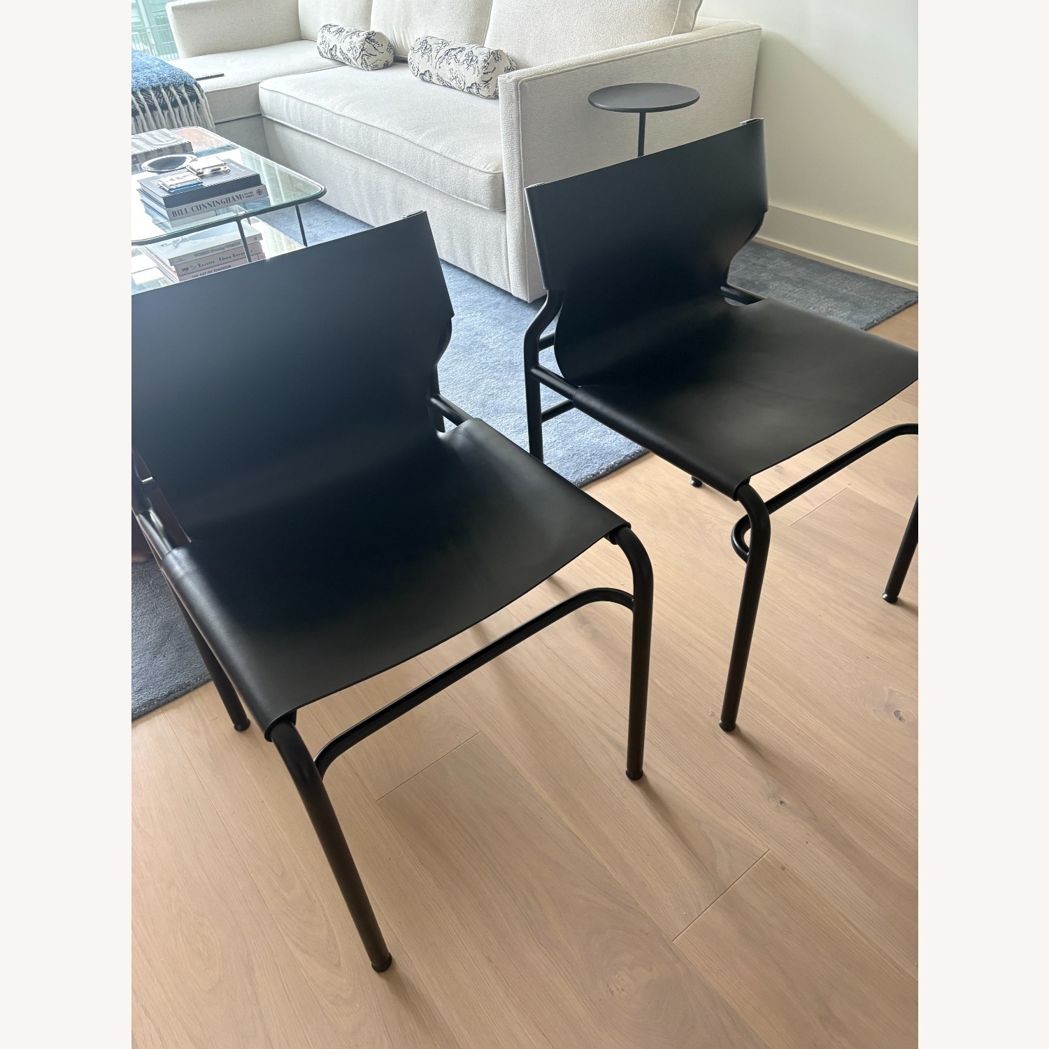 CB2 Surf Sling Black Leather Dining Chairs - image-6