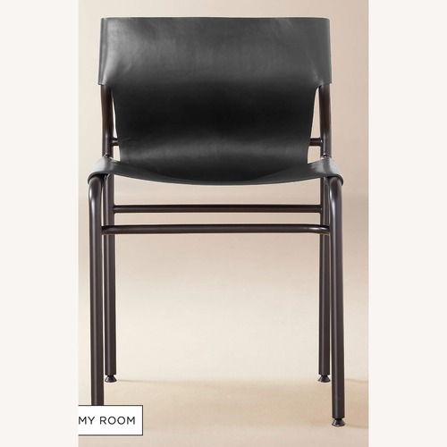 Used CB2 Surf Sling Black Leather Dining Chairs for sale on AptDeco