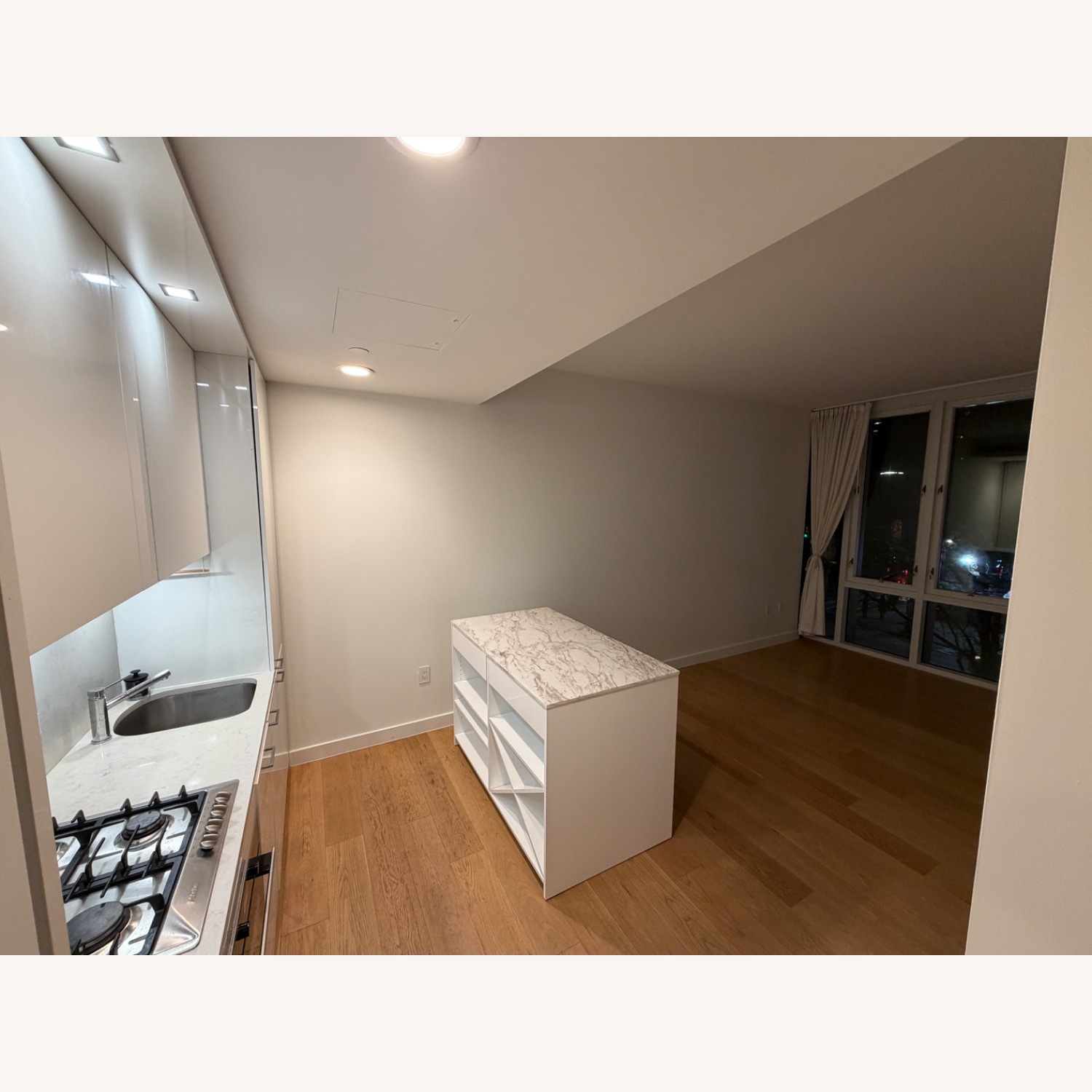 CB2 White Marble Kitchen Island - image-1