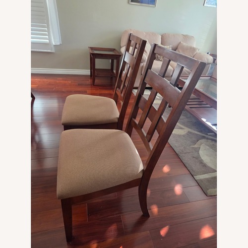 Used Living Spaces Dark Brown Fabric Dining Chairs for sale on AptDeco