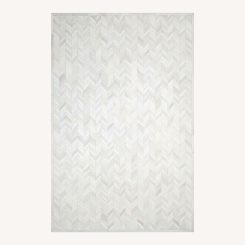 Used Cowhide Chevron Light Gray Rug 6' x 9' for sale on AptDeco