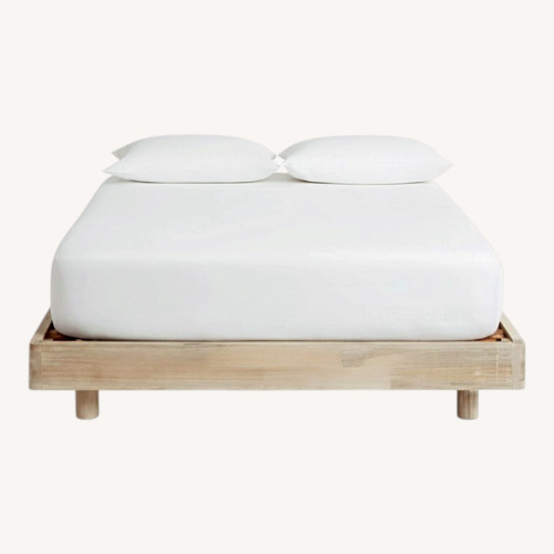 Used Pottery Barn Cayman Natural Queen Bed for sale on AptDeco