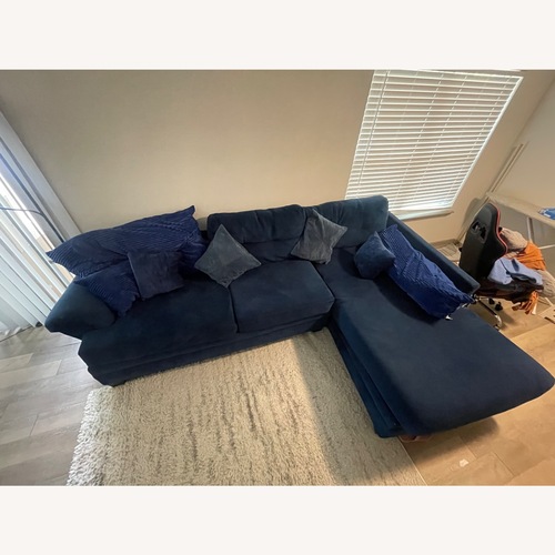 Used Blue 2 Piece Sectional for sale on AptDeco