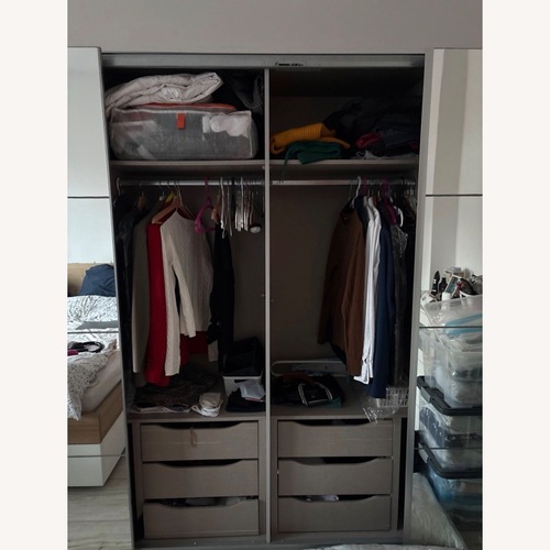 Used Wardrobe With 4 Sliding Doors and Mirrors for sale on AptDeco
