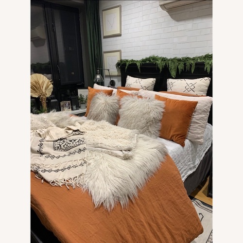 Used Black Solid Wood Bed  for sale on AptDeco