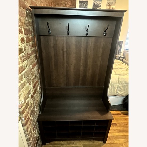 Used Prepac Manufacturing Dark Brown Wood Armoire for sale on AptDeco