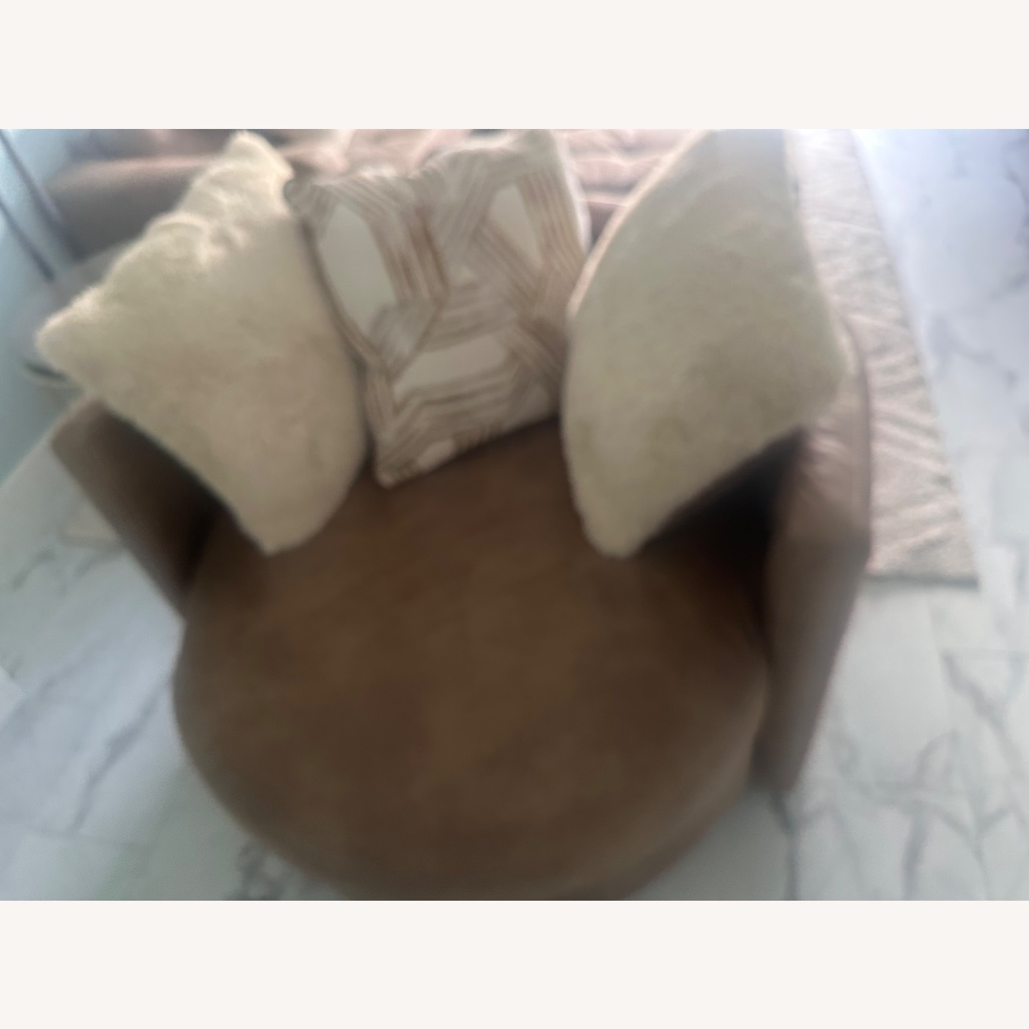 Tan Swivel Chair with Three Pillows included - image-1