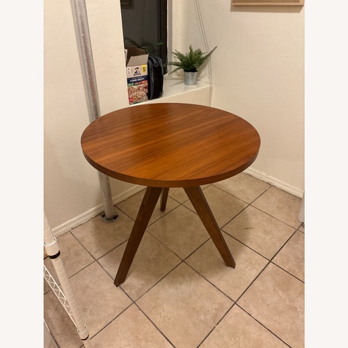 Used West Elm Tripod Dining Table (30”) for sale on AptDeco