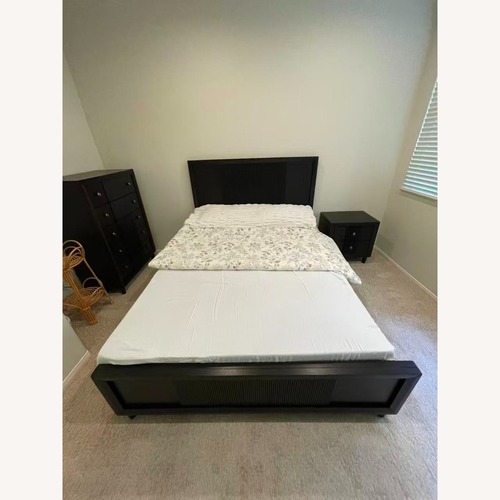 Used Ashley Furniture Urbantrack Queen Panel Bed for sale on AptDeco
