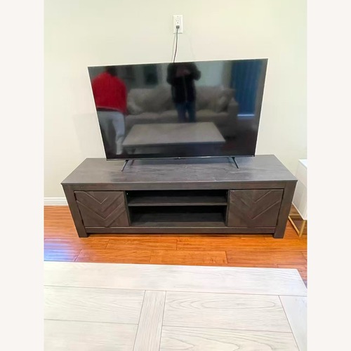 Used Ashley Furniture Cayboni 71" TV Stand for sale on AptDeco