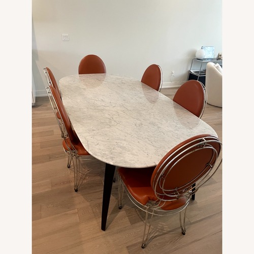 Used Gubi Elliptical White Marble Dining Table for sale on AptDeco