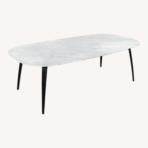 Used Gubi Elliptical White Marble Dining Table for sale on AptDeco