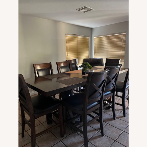 Used Ashley Furniture Dark Brown Wood Dining Sets for sale on AptDeco