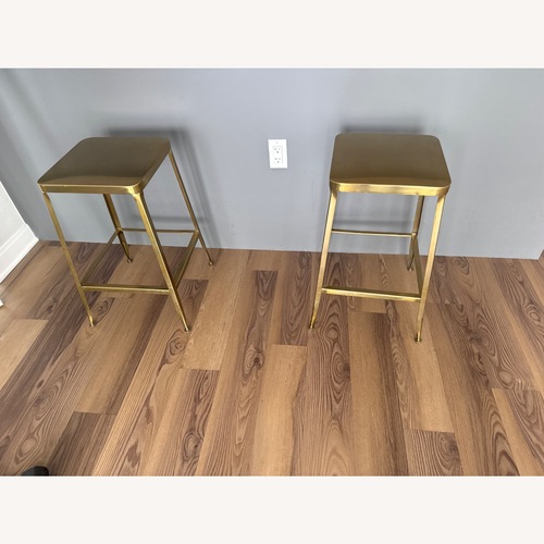 Used CB2 Gold Metal Stools for sale on AptDeco