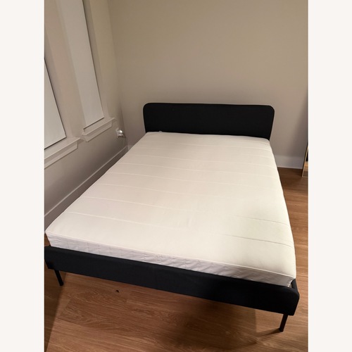 Used IKEA Black Fabric Queen Bed for sale on AptDeco