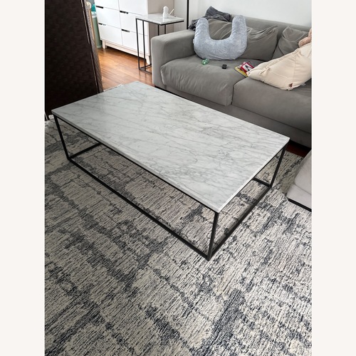 Used West Elm Streamline White Marble Coffee Table for sale on AptDeco