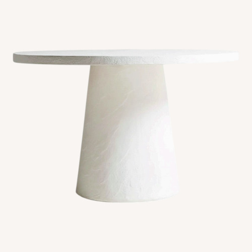 Used Crate & Barrel Leanne Ford White Concrete Dining Table for sale on AptDeco