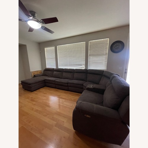 Used Reclining Sectional Sofa Cup Holders for sale on AptDeco
