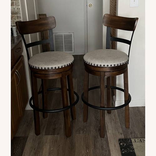 Used Ashley Furniture Bar Height Dining Chairs for sale on AptDeco