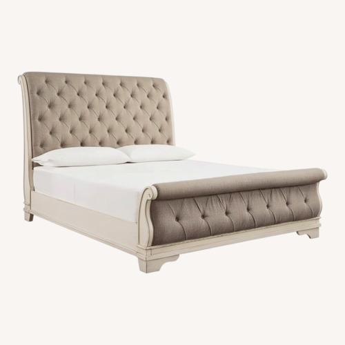 Used Ashley Realyn Queen Upholstered Sleigh Bed for sale on AptDeco