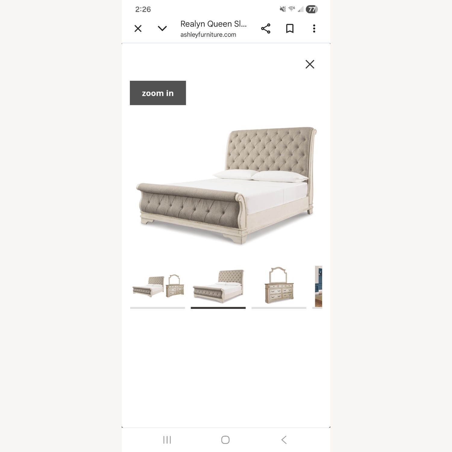 Ashley Realyn Queen Upholstered Sleigh Bed - image-1