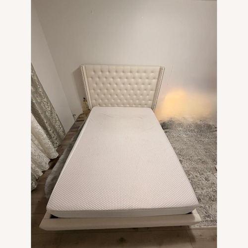 Used Natural Wood Queen Bed for sale on AptDeco