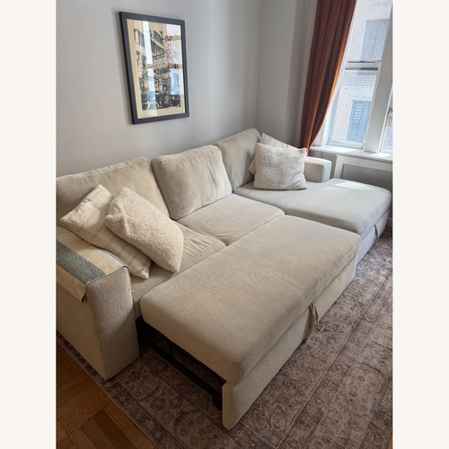 Used Living Spaces Beige Fabric 2 Piece Sectional for sale on AptDeco