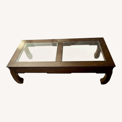Used Dark Brown Wood Coffee Table for sale on AptDeco