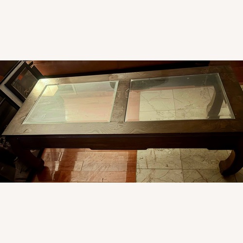 Used Dark Brown Wood Coffee Table for sale on AptDeco