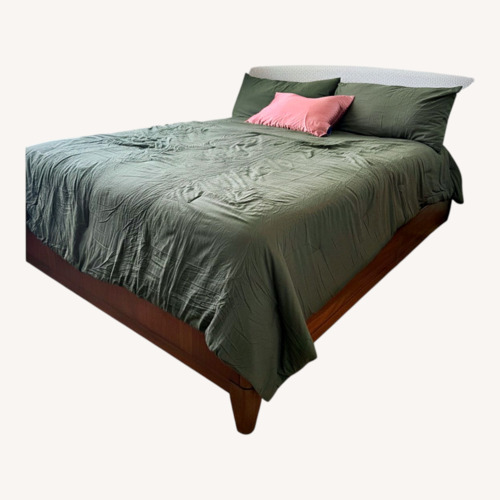 Used Raymour & Flanigan Light Gray Wood Queen Bed for sale on AptDeco