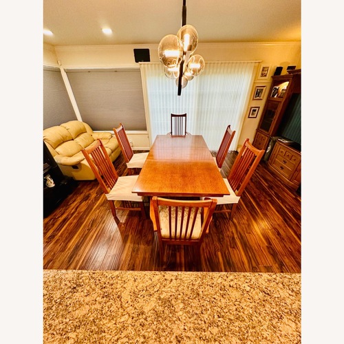 Used Wood Dining Set Extendable 6 Chairs for sale on AptDeco