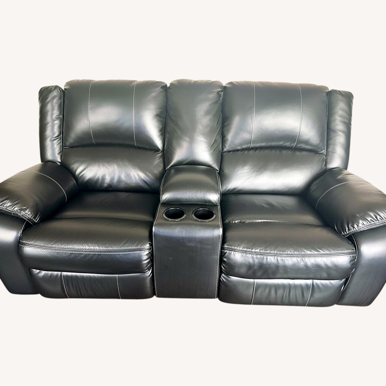 Signature Design Black Leather Loveseat - image-0