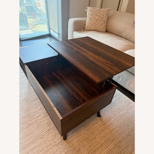 Used Amazon Dark Brown Wood Coffee Table for sale on AptDeco