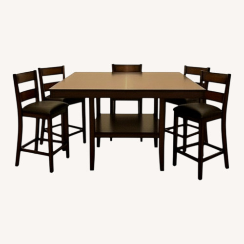 Used Rooms To Go Dark Brown Wood Dining Set for sale on AptDeco