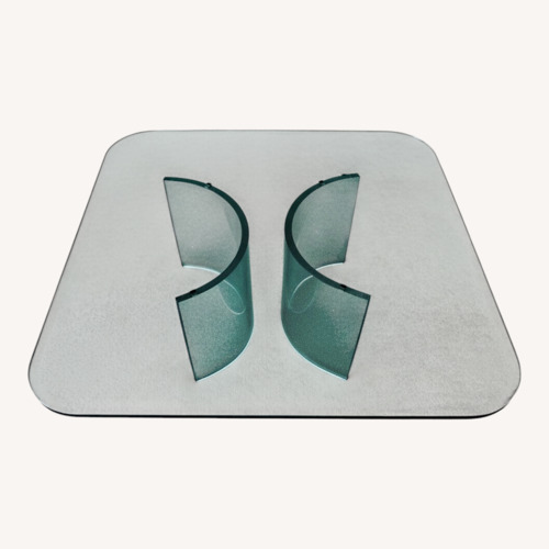 Used Tonelli Design Natural Glass Coffee Table for sale on AptDeco