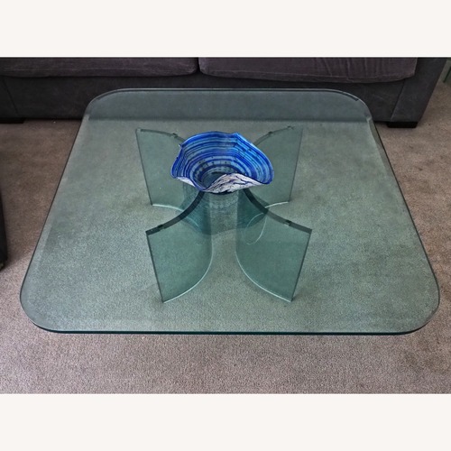 Used Tonelli Design Natural Glass Coffee Table for sale on AptDeco
