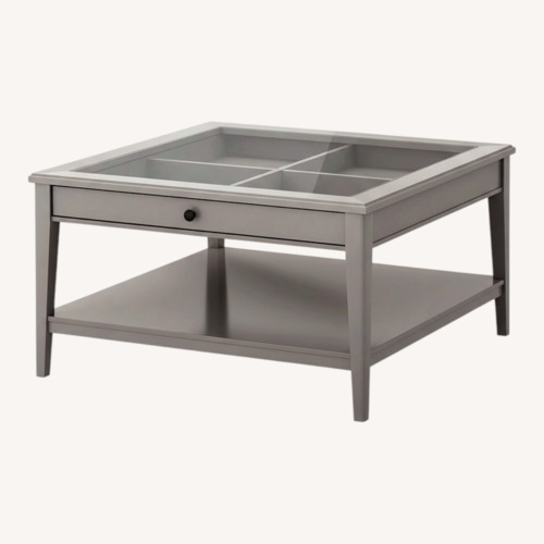 Used IKEA Light Gray Glass Coffee Table for sale on AptDeco