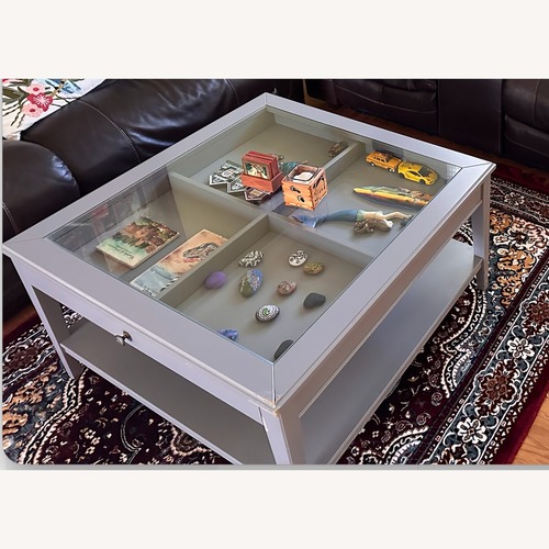 Used IKEA Light Gray Glass Coffee Table for sale on AptDeco