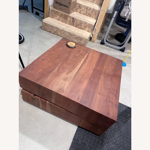 Used CB2 Spin Rotating Coffee Table with Two Drawers for sale on AptDeco