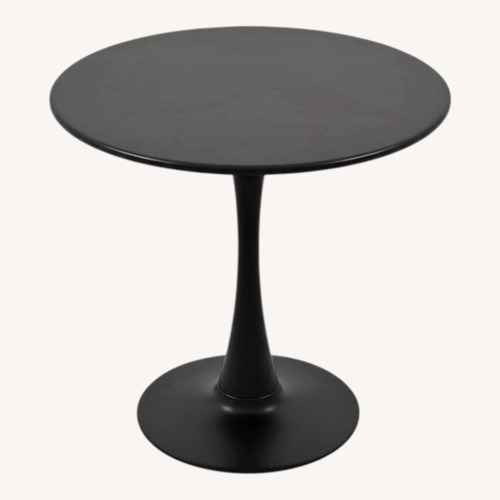 Used Amazon Black Modern Tulip Dining Table for sale on AptDeco