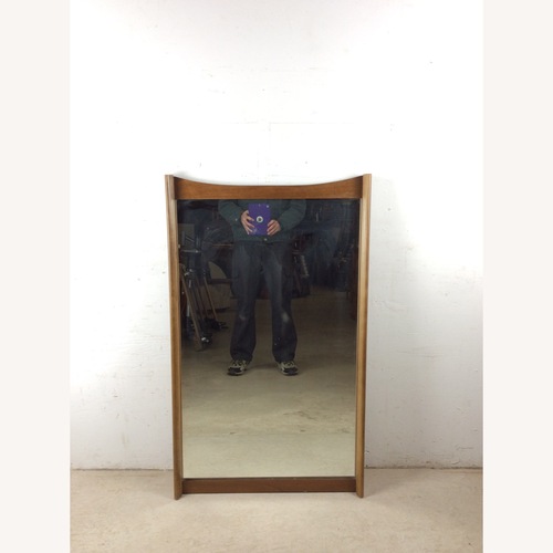 Used Mid Century Mirror with Unique Curved Top Frame for sale on AptDeco