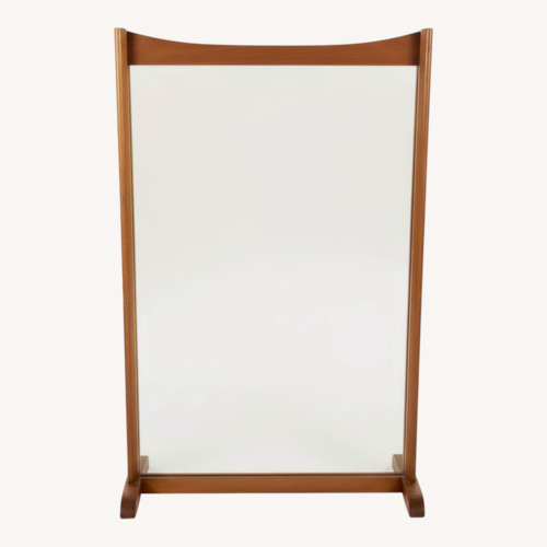 Used Mid Century Mirror with Unique Curved Top Frame for sale on AptDeco
