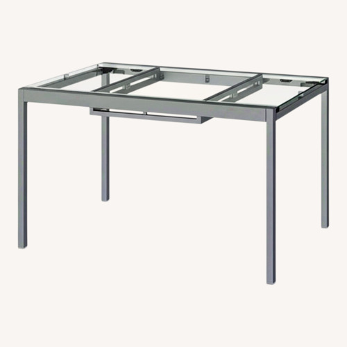 Used IKEA Transparent Glass Dining Table for sale on AptDeco