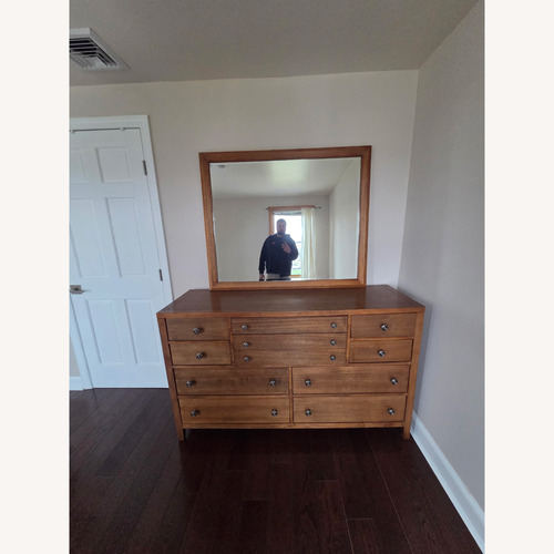 Used 11-Drawer Double Dresser with Mirror for sale on AptDeco
