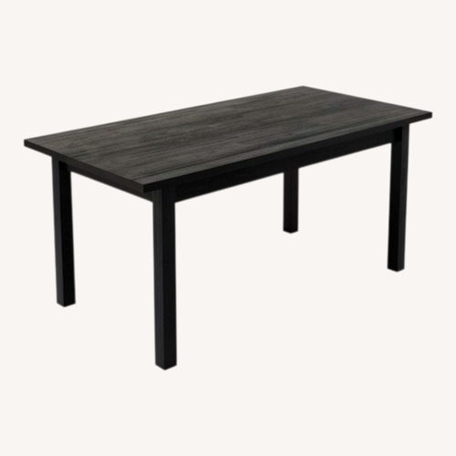 Used Magnolia Black Dining Table for sale on AptDeco
