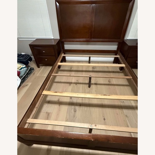 Used Vintage/Antique Dark Brown Wood Queen Bed for sale on AptDeco