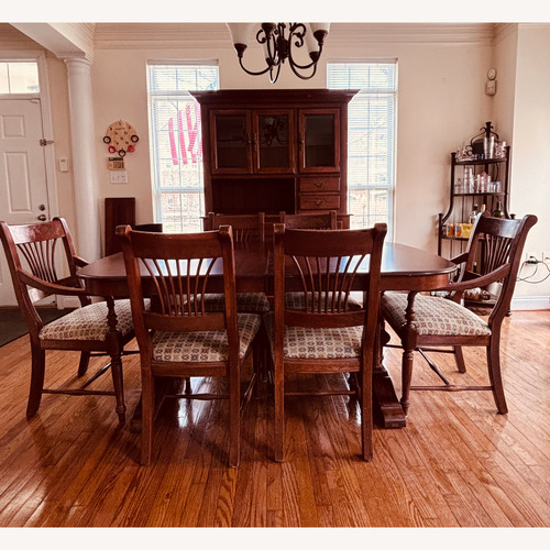 Used Vintage/Antique Dark Brown Wood Dining Set for sale on AptDeco