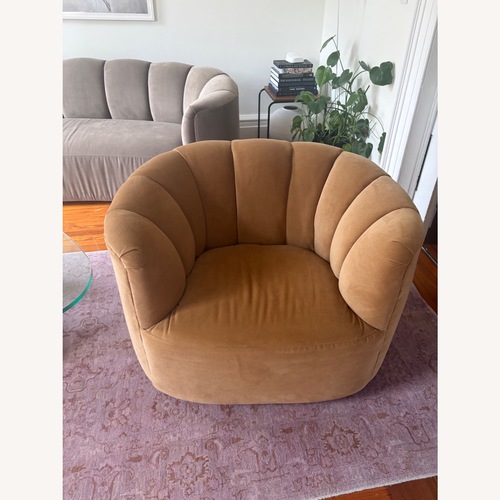 Used Amira Swivel Custom Chair  for sale on AptDeco